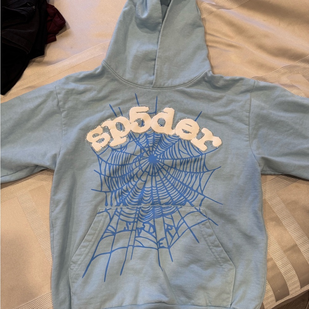 Blue and White Crew Neck Sweater with Graphic Design